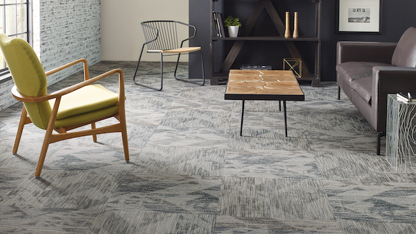 patterned grey carpet in a living room