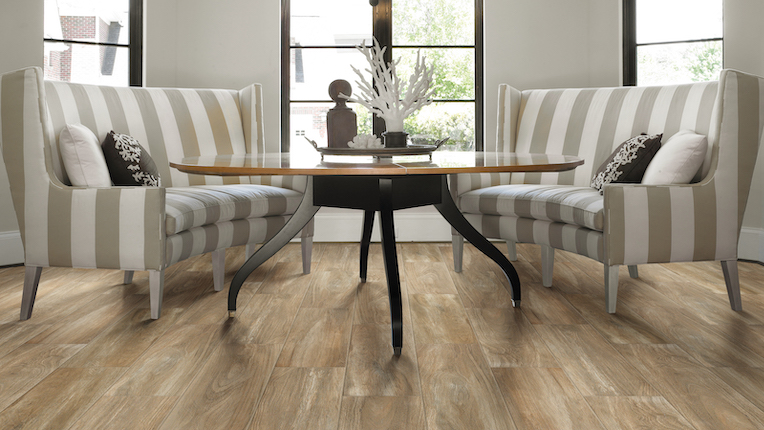 wood-look tile flooring in a dining room