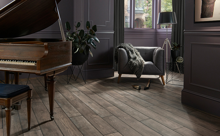 Living room with dark brown hardwood look flooring