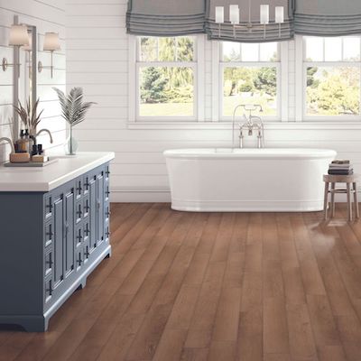LVP Flooring in a rustic Covington bathroom remodel